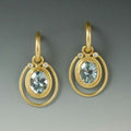 Goldene Vintage-Ohrringe mit blauem Kristall als Intarsie