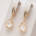 Elegante Perlenohrringe in Gold