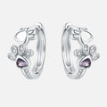 Elegante ILLA Pfoten-Huggie-Ohrringe aus 925er Sterlingsilber mit funkelnden Zirkonia und Herzstein