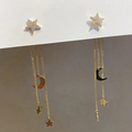 Elegante Ohrringe mit goldenen Sternen